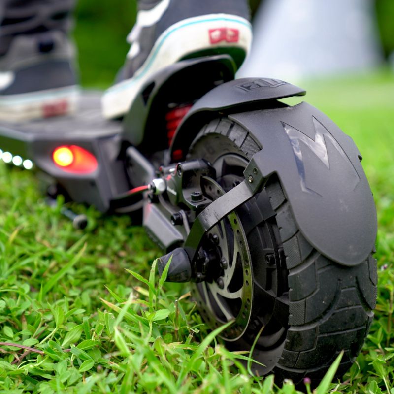Close up of the rear tire and brakes on the Mantis 40 MPH electric scooter